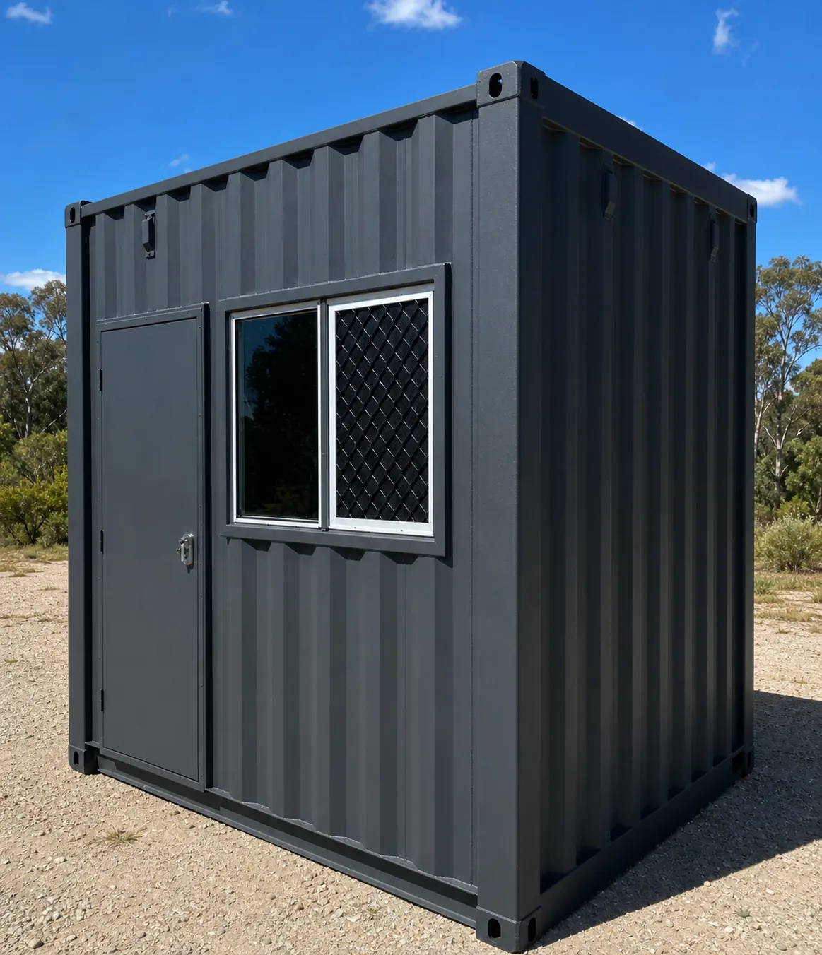 SO10 10ft container site office in charcoal with a lockable personnel door and a sliding window with security mesh, standing on a gravel pad