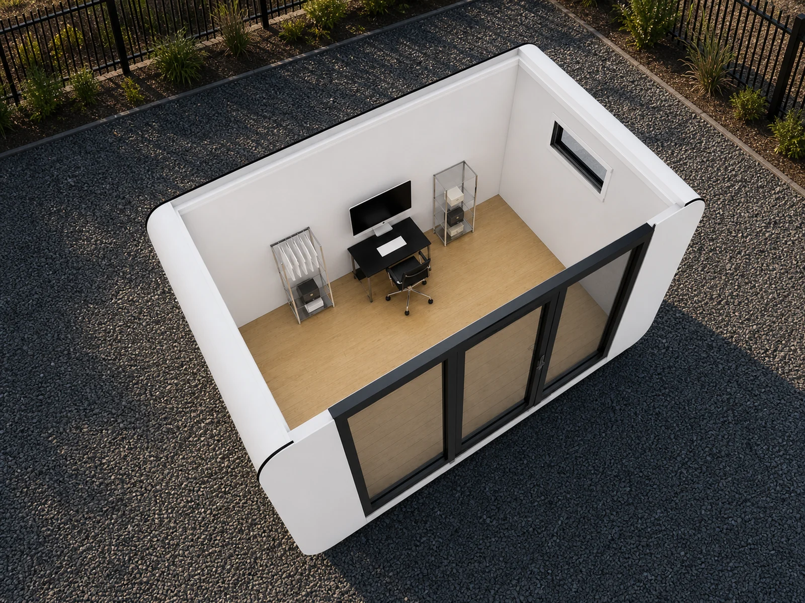 Overhead cutaway of the 4 m pod fitted as an office, a desk with a monitor and chair against the back wall between two shelving units
