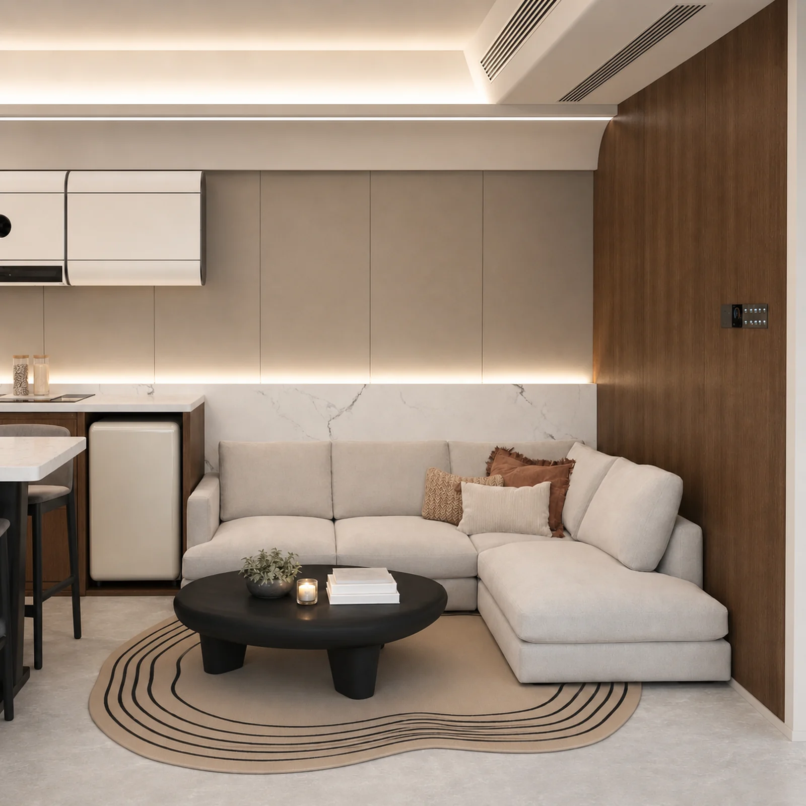 Lounge in the 9.5 m capsule, cream corner sofa with a round black coffee table on a patterned rug beside the timber lined wall
